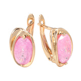 Boucle d'oreille fantaisie or rose avec pierre rubis