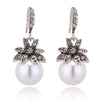 boucle d'oreille en perle fantaisie