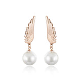 Boucles d'oreilles perles et ailes
