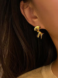 Boucles d'oreilles or géométriques