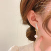 Boucle d'oreille en perle