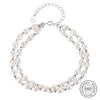 Bracelet fantaisie argent à chaine avec perles blanches