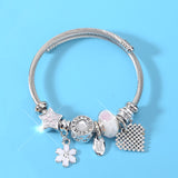 Bracelet jonc breloques féminines fleurs coeur joaillerie