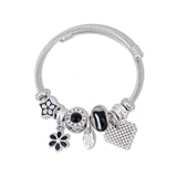 Bracelet jonc breloques féminines fleurs coeur joaillerie