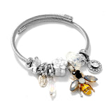 Bracelet fantaisie jonc acier breloque fleur abeille