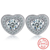 Boucle d'oreille fantaisie argent coeur et diamants