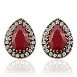 Boucle d'oreille fantaisie oeuf rouge rubis et diamants