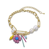 Bracelet fantaisie or chainette à breloque perles et fleur