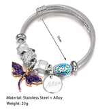 Bracelet fantaisie jonc breloque papillon et perle