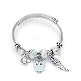 Bracelet fantaisie breloque jonc acier noir et blanc hibou